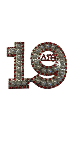Number 19 brooch