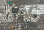 KAC Brooch