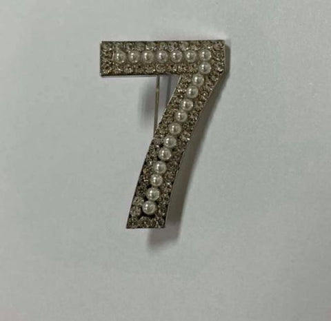seven brooch