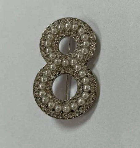 Eight brooch